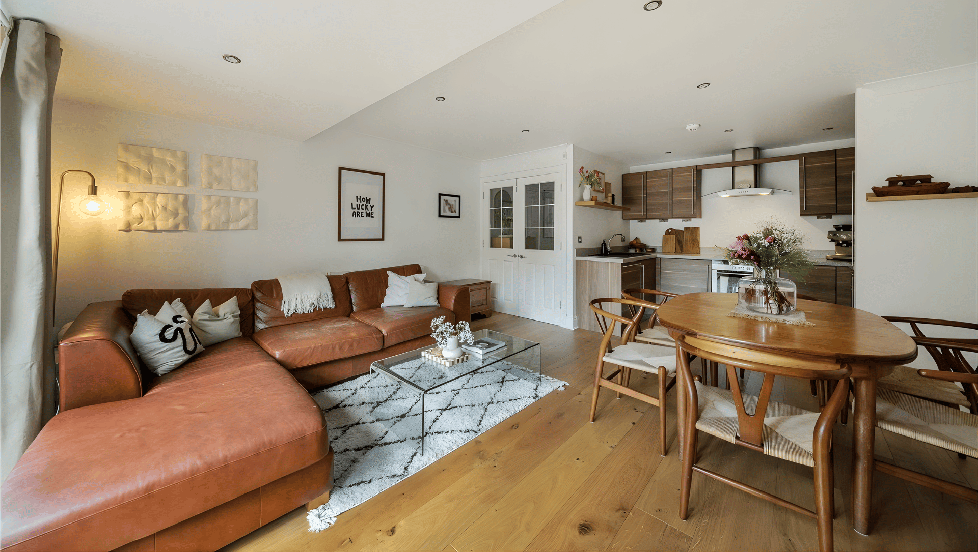 Modern high-end living room interior with premium finishes and styling details that increase property value in £600k homes for international buyers
